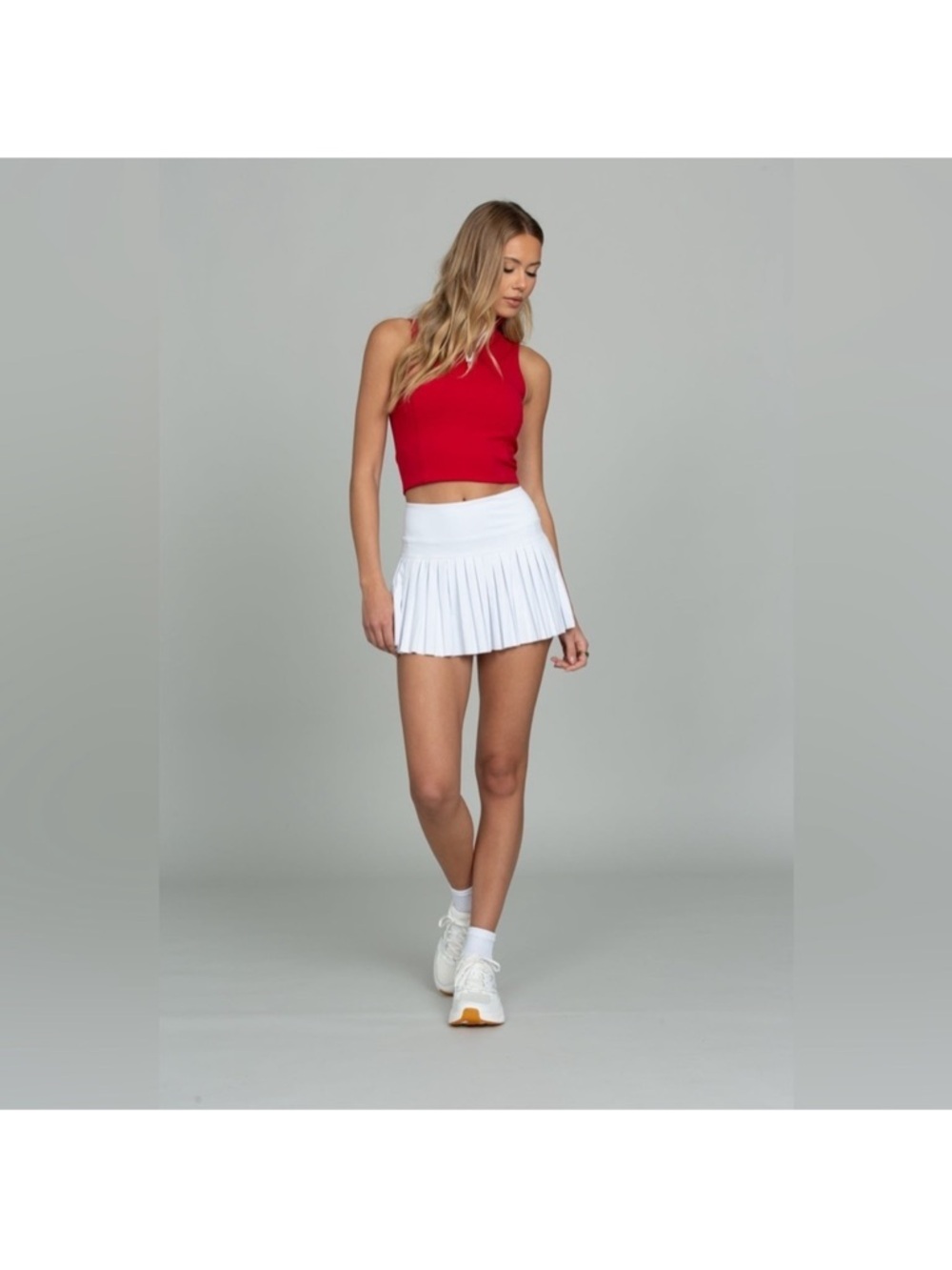 OFF-WHITE PLEATED TENNIS
SKIRT size M  ,GOLDHINGE.
